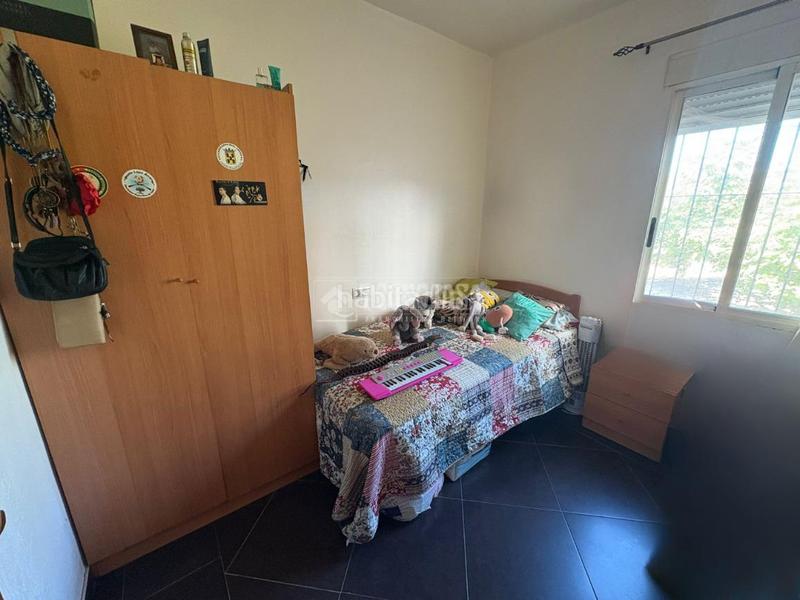 Foto b7e49a08-3c84-4ddc-993c-443c2d3e34f1. Casa aparellada a Martos