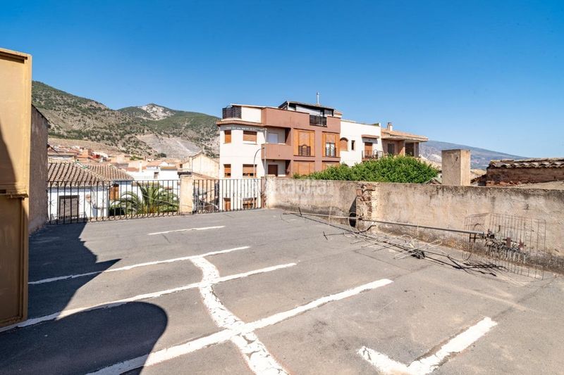 Foto 444a39ed-1b2c-43ed-b667-53d502922b57. Casa aparellada amb aparcament a Padul
