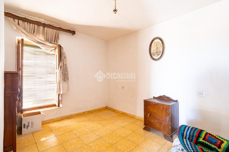 Foto ef6e4c22-566c-4726-947f-62317f021f55. Casa aparellada amb aparcament a Padul
