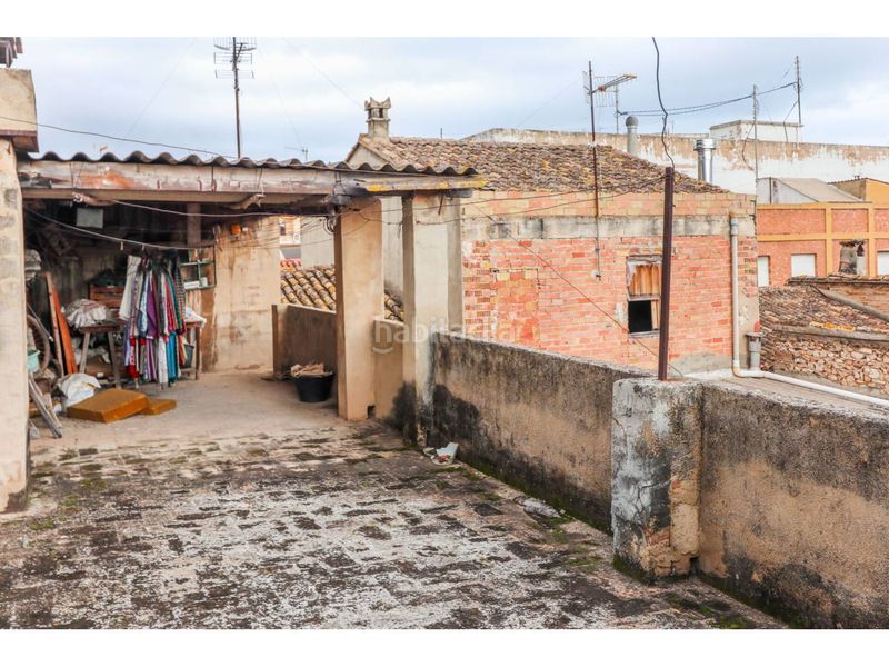 Foto ff0608bc-43b4-49d0-9148-9cb7be5e3603. Casa adosada en calle san fernando 7 gran casa para dos familias o con muchas opciones en el centro en Oliva