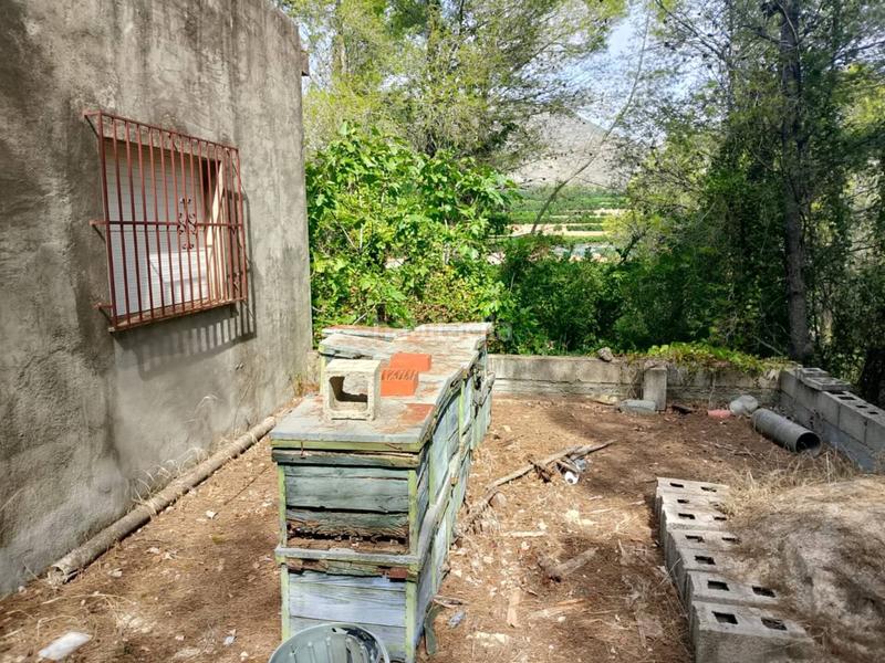 Foto 91c07906-af78-47cf-aa81-69db3d7421a4. Casa terreno con casa para reformar en marxuquera, palma de gandia en Palma de Gandía