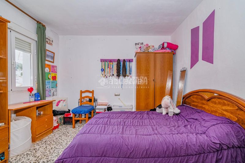 Foto 4cf0088c-e2b5-41d8-9cff-8d0c265211e5. Casa aparellada a Loja