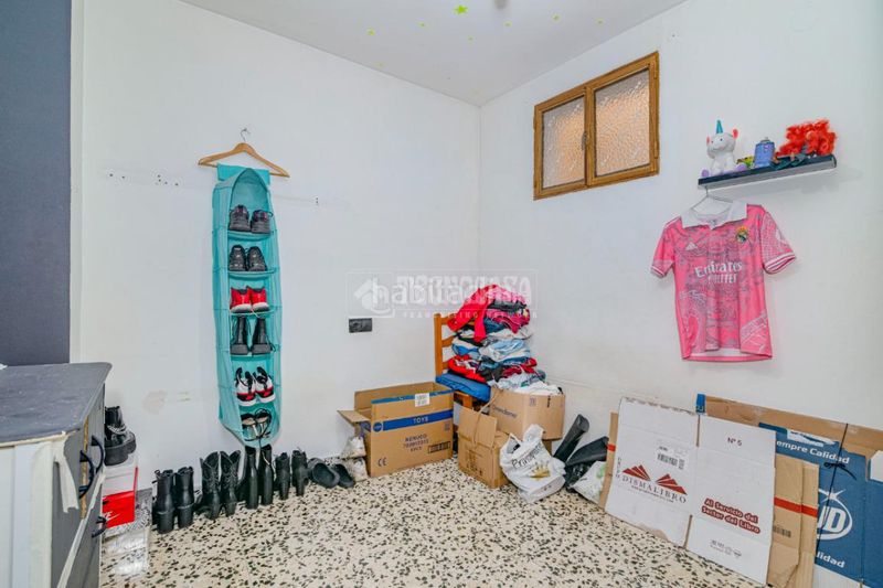 Foto c21f750c-9d21-4b1c-ac49-5f5aa1901433. Casa aparellada a Loja