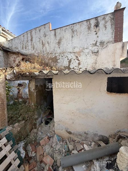 Foto 6befefad-f238-4711-b4ee-49b1cbc268a2. Casa aparellada a Loja