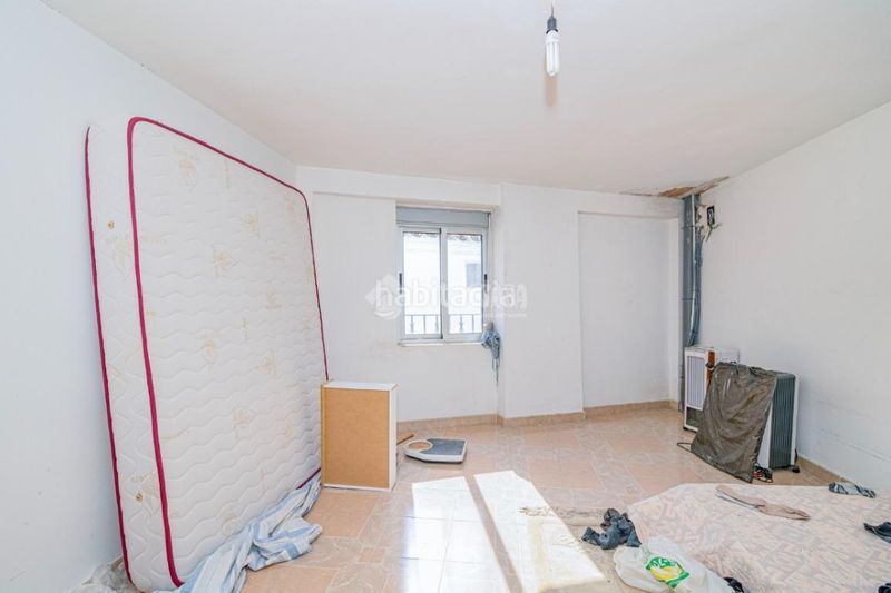 Foto a91f3b87-93ec-4168-8704-bdf94b5eff6e. Casa aparellada a Loja