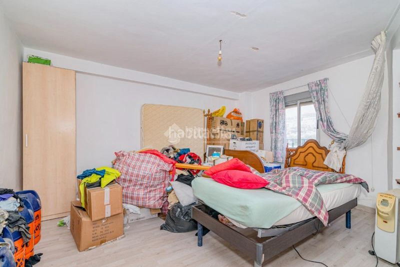 Foto b61283f5-a627-4e74-b276-6064182c4363. Casa aparellada a Loja