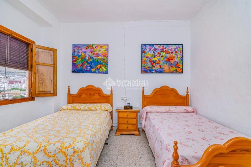 Foto ab6554bc-896b-4f7c-8bfb-28db7d510ee2. Casa aparellada a Loja