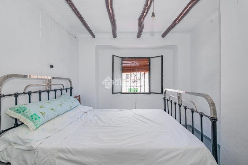 Foto 3cace419-7f98-41e8-b282-11a136444d68. Casa aparellada a Loja