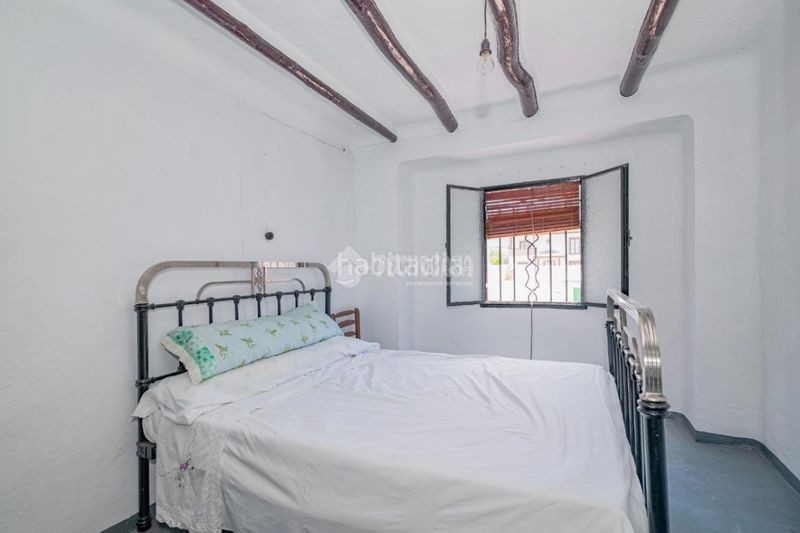 Foto 510e3a68-37f4-4800-8232-bba76d587f0b. Casa aparellada a Loja