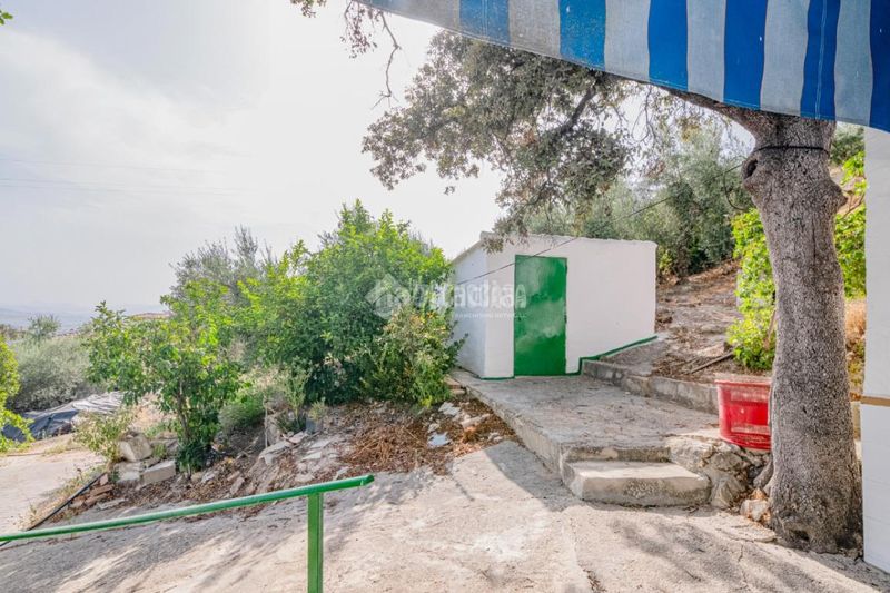 Foto eabe0137-d1a4-43b3-930f-147e0cbef08d. Masia a Algarinejo