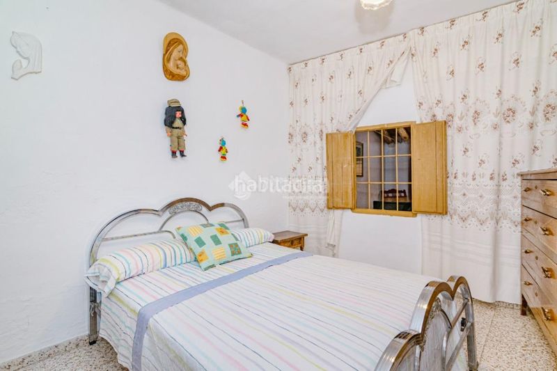 Foto 6168f178-ce8a-4e46-8333-7aa3cdf4e488. Casa aparellada a Zagra