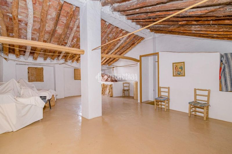 Foto f10fe761-308e-43a3-bb47-17c80f5e413d. Casa aparellada a Zagra
