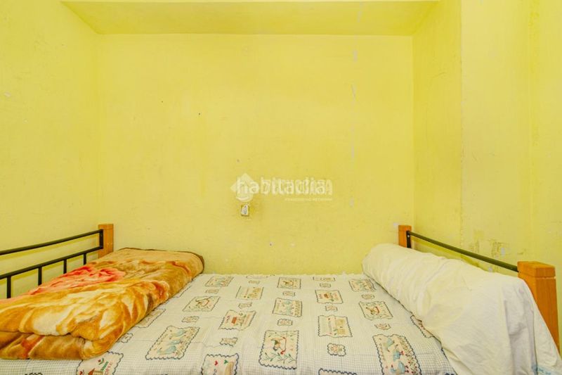Foto 8191c7a0-a48b-4638-8e99-1762f0fef6a4. Casa aparellada amb aparcament a Loja