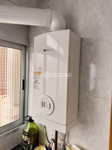 Foto c38a5e8b-a690-4905-9a72-cf123c86236e. Pis amb calefacció aparcament a Vinateros Madrid