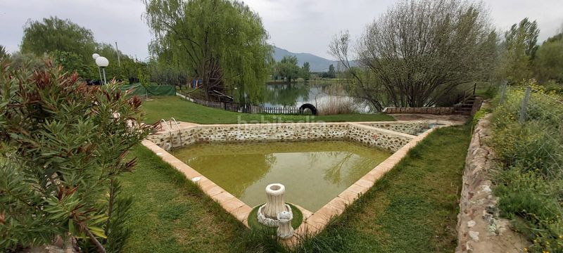 Foto cd837bc9-1629-4707-a2b0-b79786f9e027. Xalet amb xemeneia calefacció aparcament piscina a Malagón