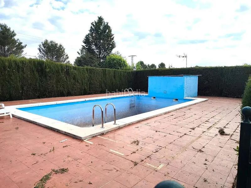 Foto 60355fee-a32e-4d70-adfd-ef83fe14dd83. Chalet avec cheminée chauffage parking piscine dans Miguelturra