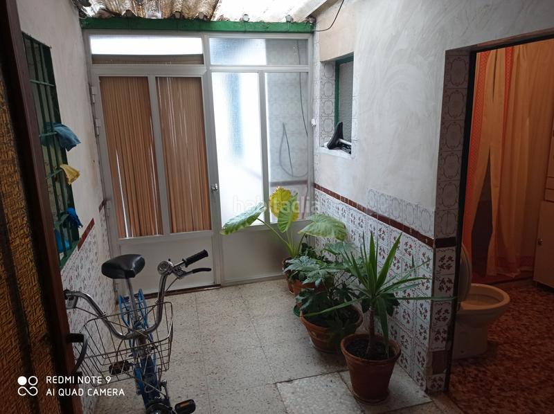 Foto df94e024-e0ba-4c74-86ba-527a2acd16ec. Casa adossada amb xemeneia calefacció a Miguelturra