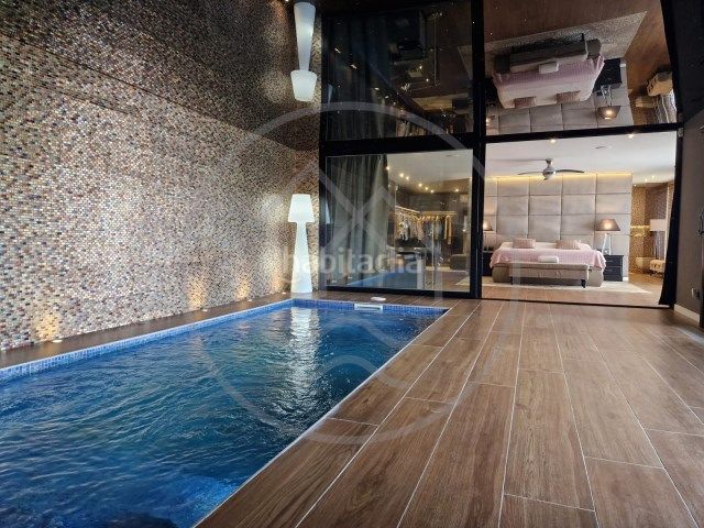 Foto fcd5b648-f794-4991-917d-72614320f334. Xalet amb xemeneia calefacció aparcament piscina a Palamós