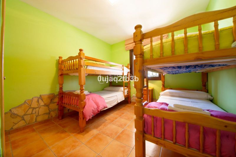 Foto 543a86e3-5299-49c2-9499-55a1a6fe39a8. Chalet avec parking piscine dans altos de Estepona Estepona