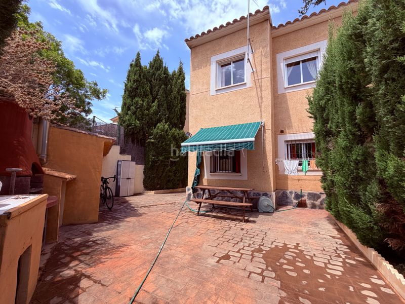 Foto b6dd9a72-bdbb-4400-8572-45ae0e491564. Casa aparellada amb xemeneia calefacció a Aigües