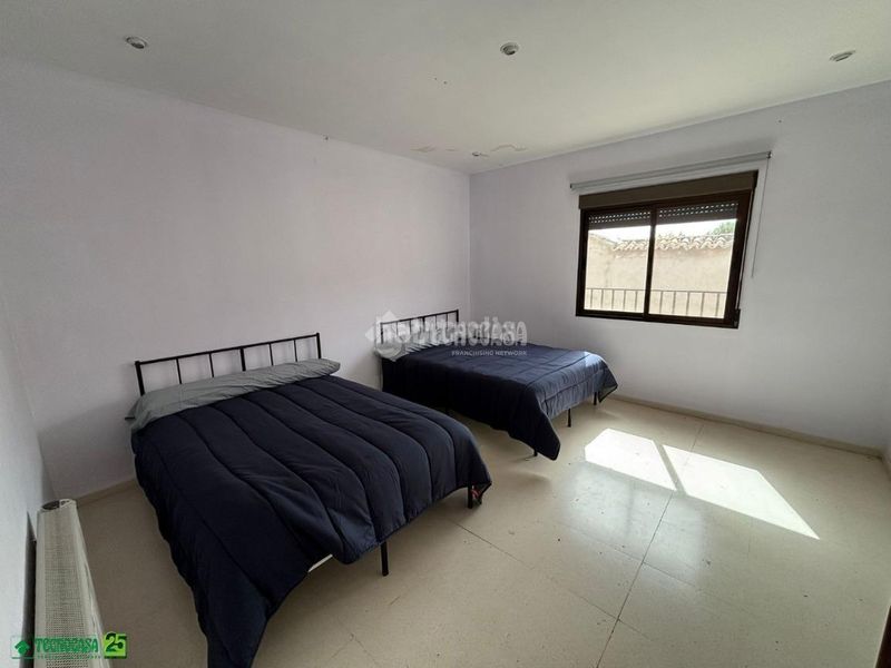 Foto f37f7ccc-f7ad-4662-8607-6c67dda7dd7d. Casa aparellada a Centro Puertollano