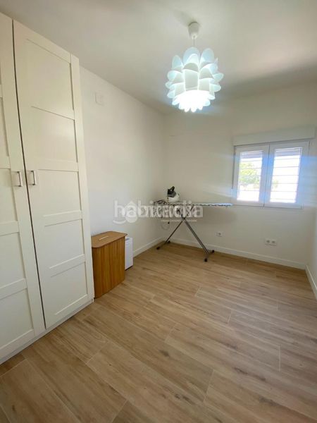 Foto 0fe8306c-ccde-4c67-bf37-b2c5292df140. Casa aparellada a La Hacienda - Nueva Andalucía Dos Hermanas
