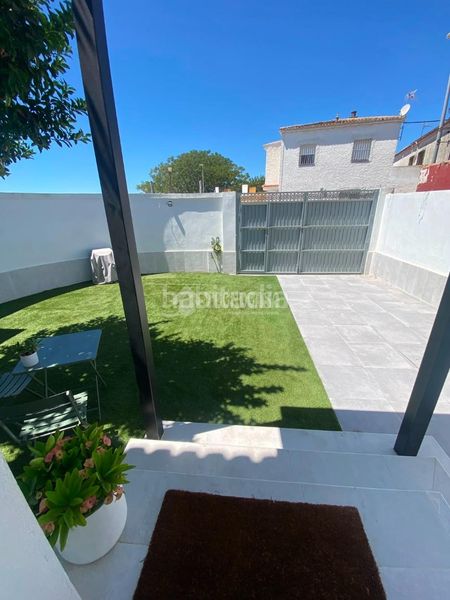 Foto c82addc8-c028-4ae9-96a0-5ddd225def64. Casa aparellada a La Hacienda - Nueva Andalucía Dos Hermanas