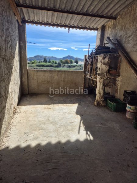 Foto be3f8e4c-1f70-4f96-9e55-255a11bb6fe2. Casa adossada amb xemeneia aparcament a Ceutí