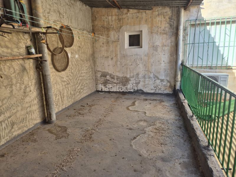 Foto e3b9a2e0-c435-4c9a-b55d-6e6a9c54879e. Casa adossada amb xemeneia aparcament a Ceutí