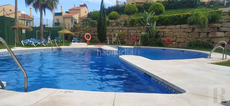 Foto 1fe8f2f0-3850-4bbe-a9af-532e0a7730cd. Casa amb aparcament piscina a Riviera del Sol Mijas