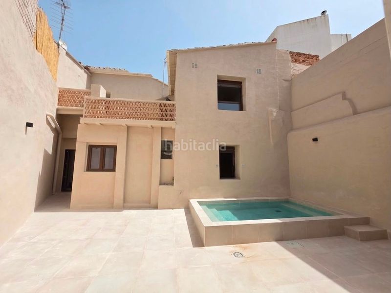 Foto e886f2e6-357e-427c-8ab4-a0db32b17030. Casa adossada amb piscina a Casco Urbano Náquera