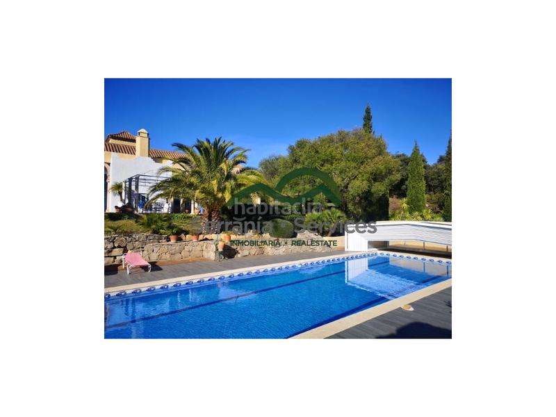 Foto 9387c903-3379-4fe6-9ba9-a75b152c1e80. Casa  de campo 7 dormitoriospiscina casa huespedes16 has en Gaucín