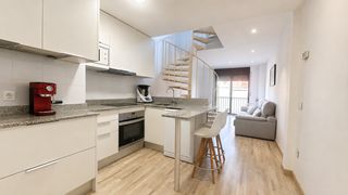 Duplex  Olot. Duplex reformado con parking y dos terrazas en pleno centro de f