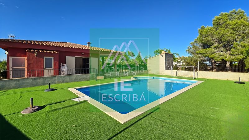 Foto e6eff8e8-d00c-4a46-94bf-bae640c18b74. Chalet in urbanizacion lloma molina 13 in Catadau