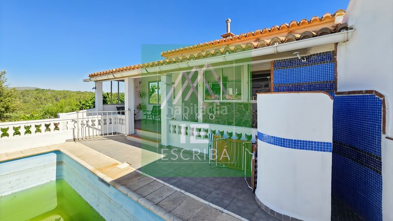 Foto 7cfb4678-fc89-4447-876b-dfa5f6a4a7dd. Xalet amb xemeneia calefacció aparcament piscina a Catadau