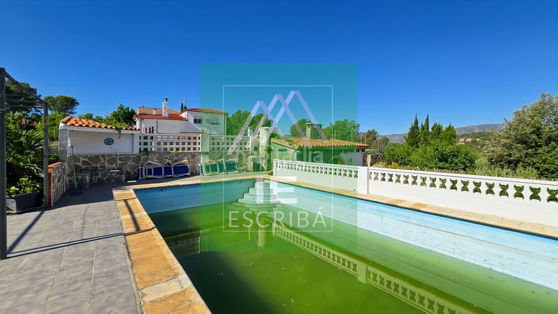 Foto ab4c073d-5307-4fc9-9395-ca58ebd9705c. Xalet amb xemeneia calefacció aparcament piscina a Catadau