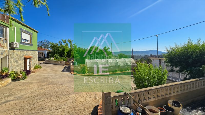 Foto d67d4363-759d-495f-9090-9b1e061a861d. Xalet amb xemeneia calefacció aparcament piscina a Catadau