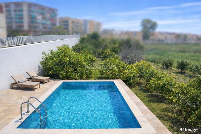 Foto 63e144ed-cd49-482e-9db1-e568638b09de. Casa amb xemeneia calefacció aparcament a Benimàmet Valencia