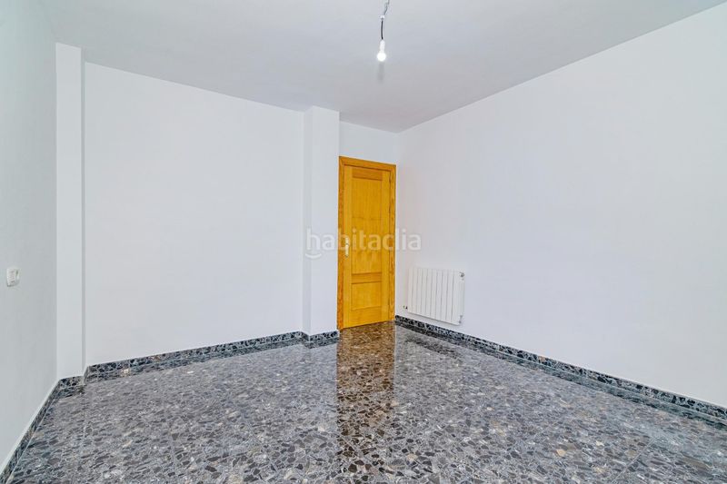 Foto f3a1e540-7930-4650-996a-3c273a0ac8fd. Casa adossada amb aparcament a Las Flores - Huerta Gabias (Las)