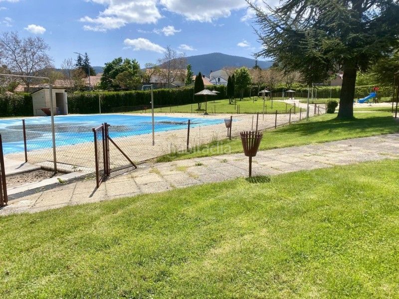Foto 225b53de-9f6d-486e-b69b-c900221d1bc8. Pis amb calefacció aparcament piscina a San Rafael Espinar (El)