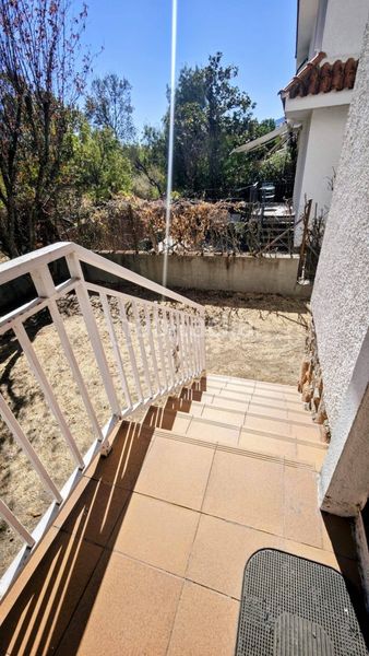 Foto ba172d9e-0be7-4aed-a4b8-ffc86db69b8f. Casa pareada  en venta en urbanizacion madrid en Alpedrete