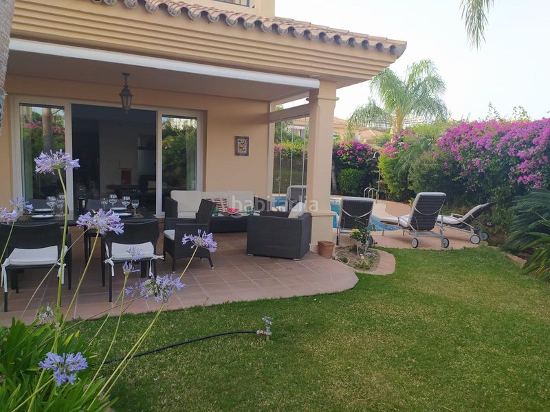 Foto 147a096e-c806-4d5a-807b-40b0e35ab2bd. Casa aparellada amb xemeneia calefacció aparcament piscina a Mijas