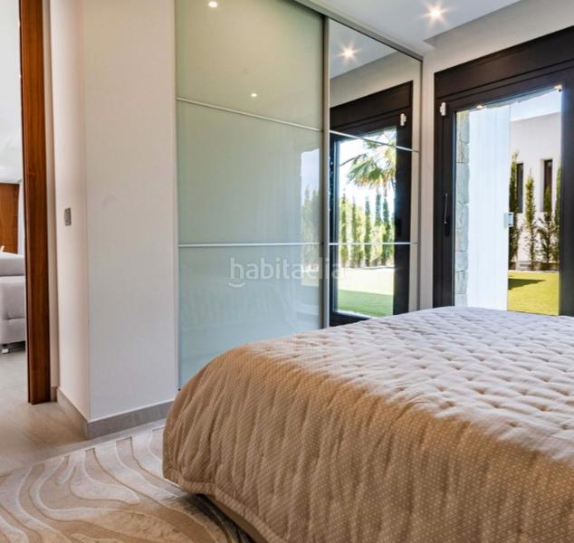 Foto 73c84ca2-d7b1-4fe4-8e40-b7f0a70e8a0f. Chalet con parcheggio piscina in Golf Bahía Finestrat