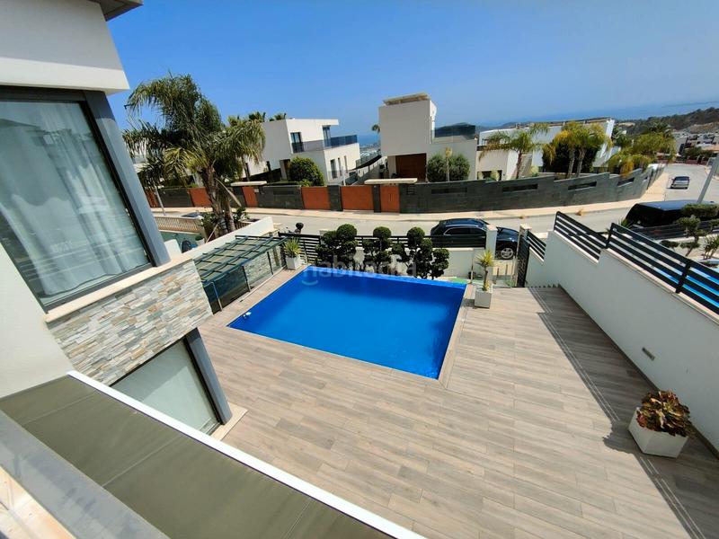 Foto 5cace74a-7fd3-4608-bb34-72364e3e697a. Chalet with parking pool in balcón de Finestrat-terra marina Finestrat