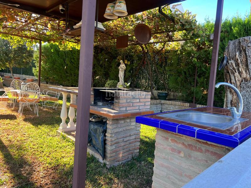 Foto d4c0265b-ba1c-4bf5-b4ef-ad242edd818a. Chalet avec parking piscine dans Gerena