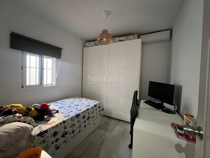 Foto 60c666ca-6cc7-413e-80eb-b7615d1ea432. Casa amb aparcament a Guillena pueblo Guillena