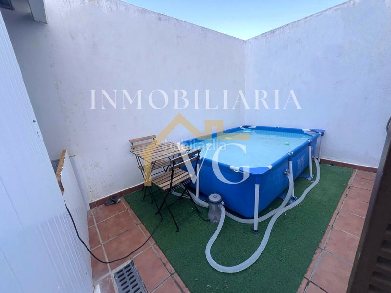 Foto deda14b4-bfd2-4a64-aaae-a1a3ec2ecd8f. Casa adossada amb calefacció a Guillena pueblo Guillena