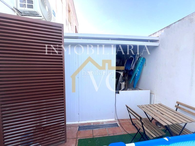 Foto f674e982-6d0a-4768-b57e-6c6e3e8c0503. Casa adossada amb calefacció a Guillena pueblo Guillena