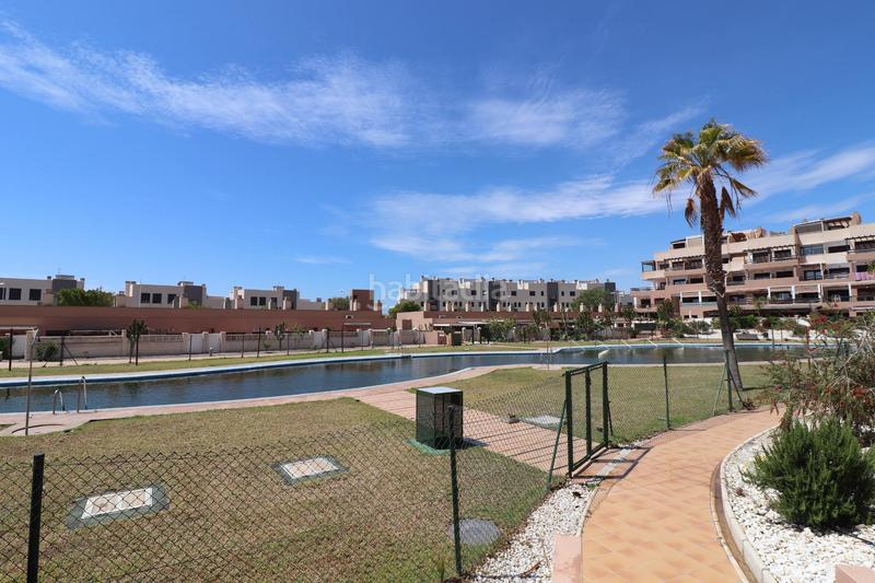Foto 3bd9fadd-2df4-41f4-8853-d97c3df7ffb3. Casa adossada amb aparcament piscina a El Toyo Almería