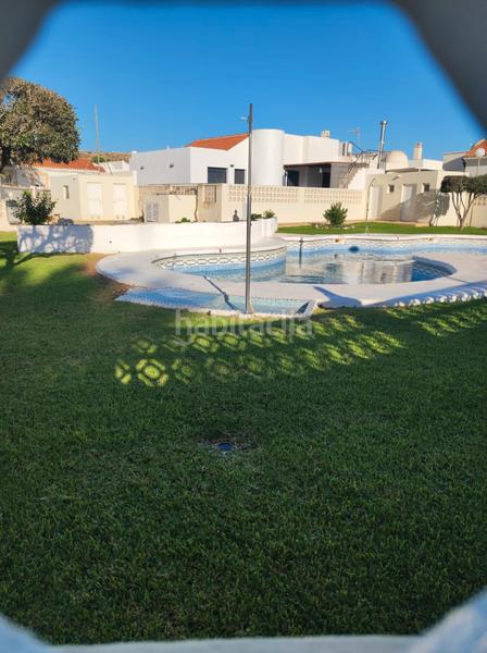 Foto cdb3752b-9e2a-457d-b020-e6bb81e1fa8e. Casa a schiera con parcheggio piscina in Almerimar Ejido (El)